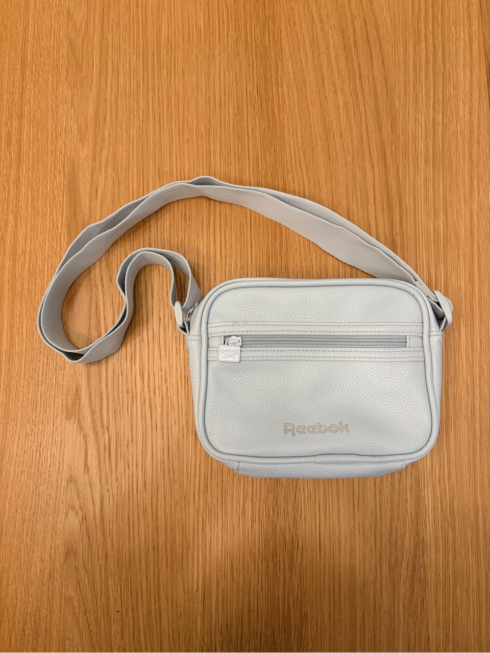 Reebok Baby Blue women’s Crossbody/Shoulder Bag with adjustable strap.